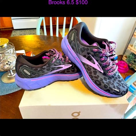 purple leopard print brooks shoes.